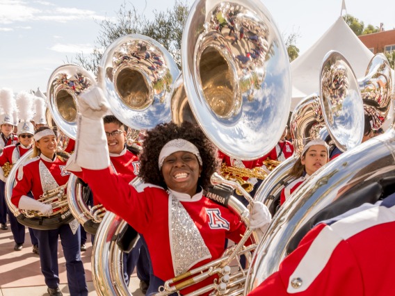 Tuba players marching