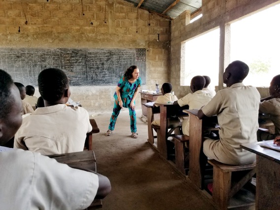 Image of Peace Corps Volunteer teaching middle school in rural Benin.