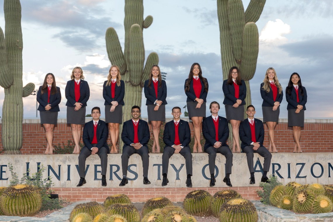 Group photo of students at University of Arizona sign