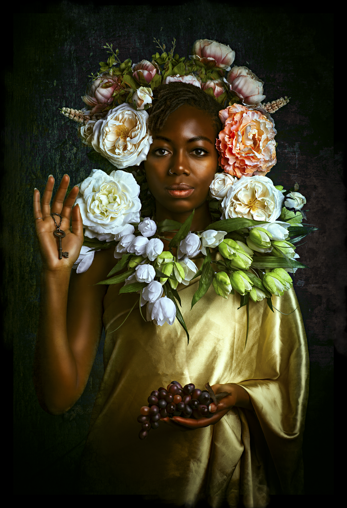 Black woman with flowers, holding grapes