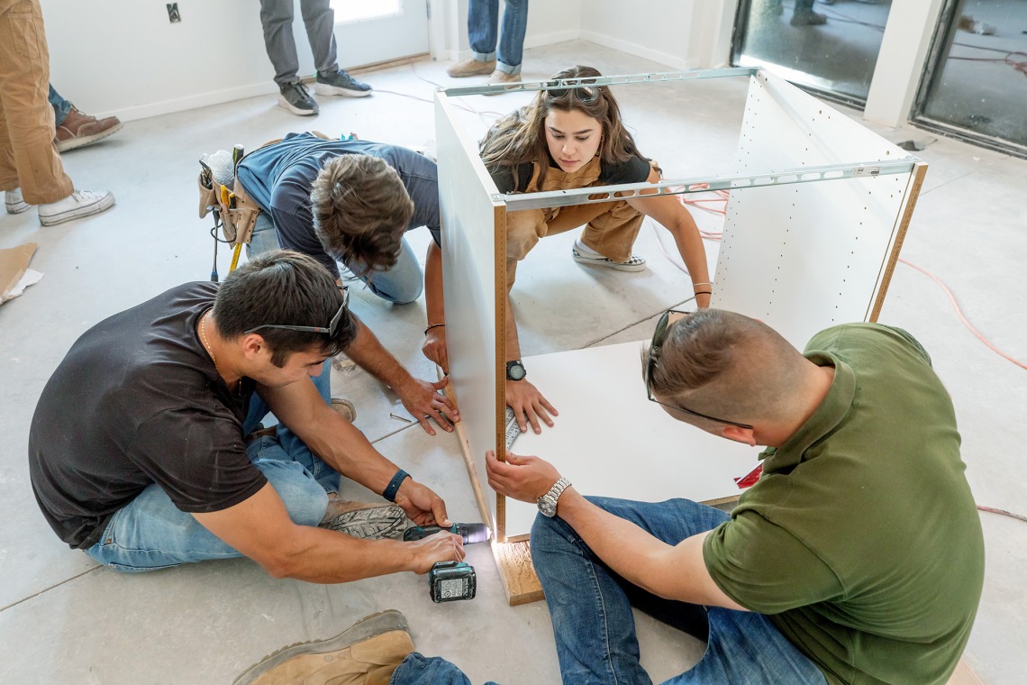 Students building furniture