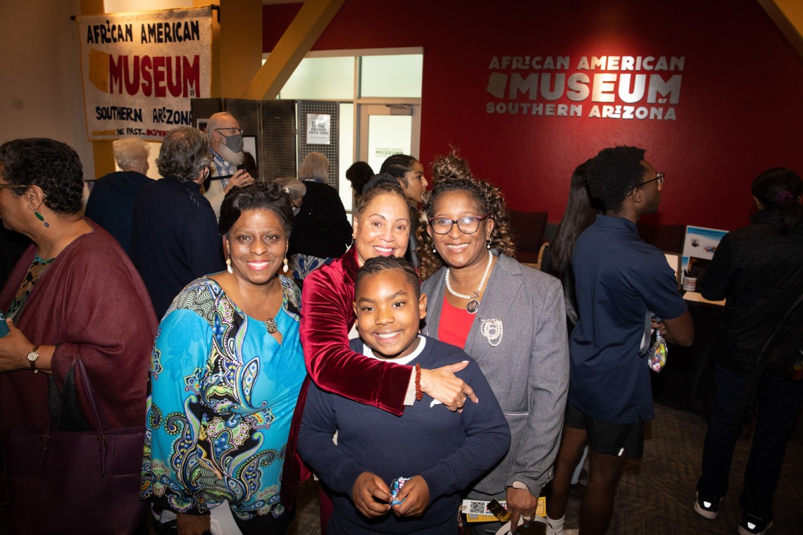 A photograph of board members and guests at the  African American Museum of Southern Arizona.