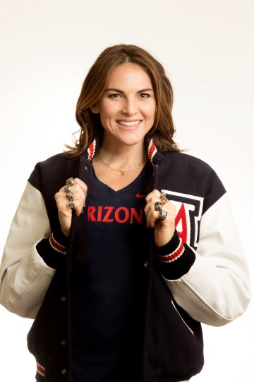 A photograph of Lacey John wearing University of Arizona merchandise 