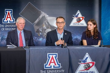 A photograph of UA President Robert C. Robbins, Dante Lauretta and Keara Burke